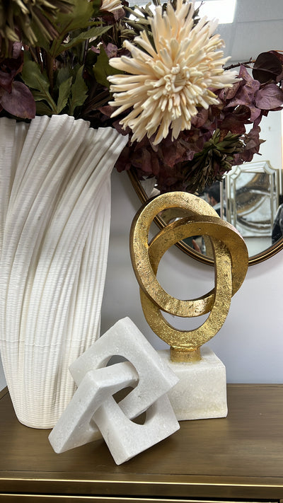 Gold loop sculpture abstract