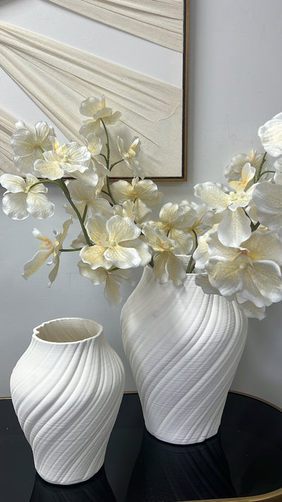 Pleated white ceramic vase