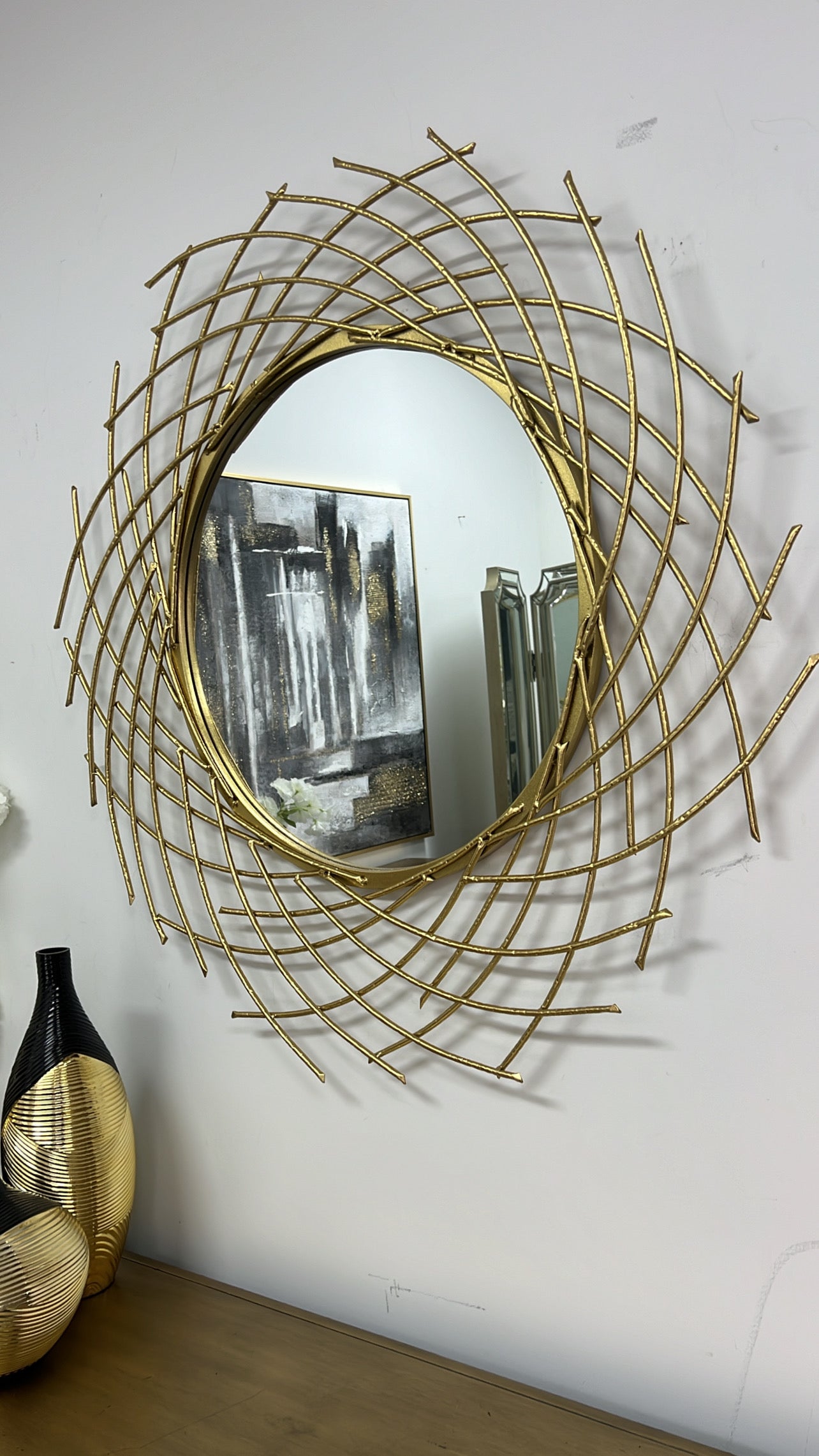 Circular spiral Gold wall mirror