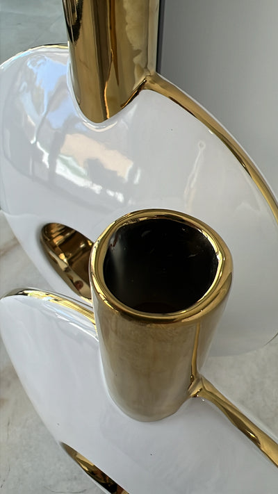 White and gold vase