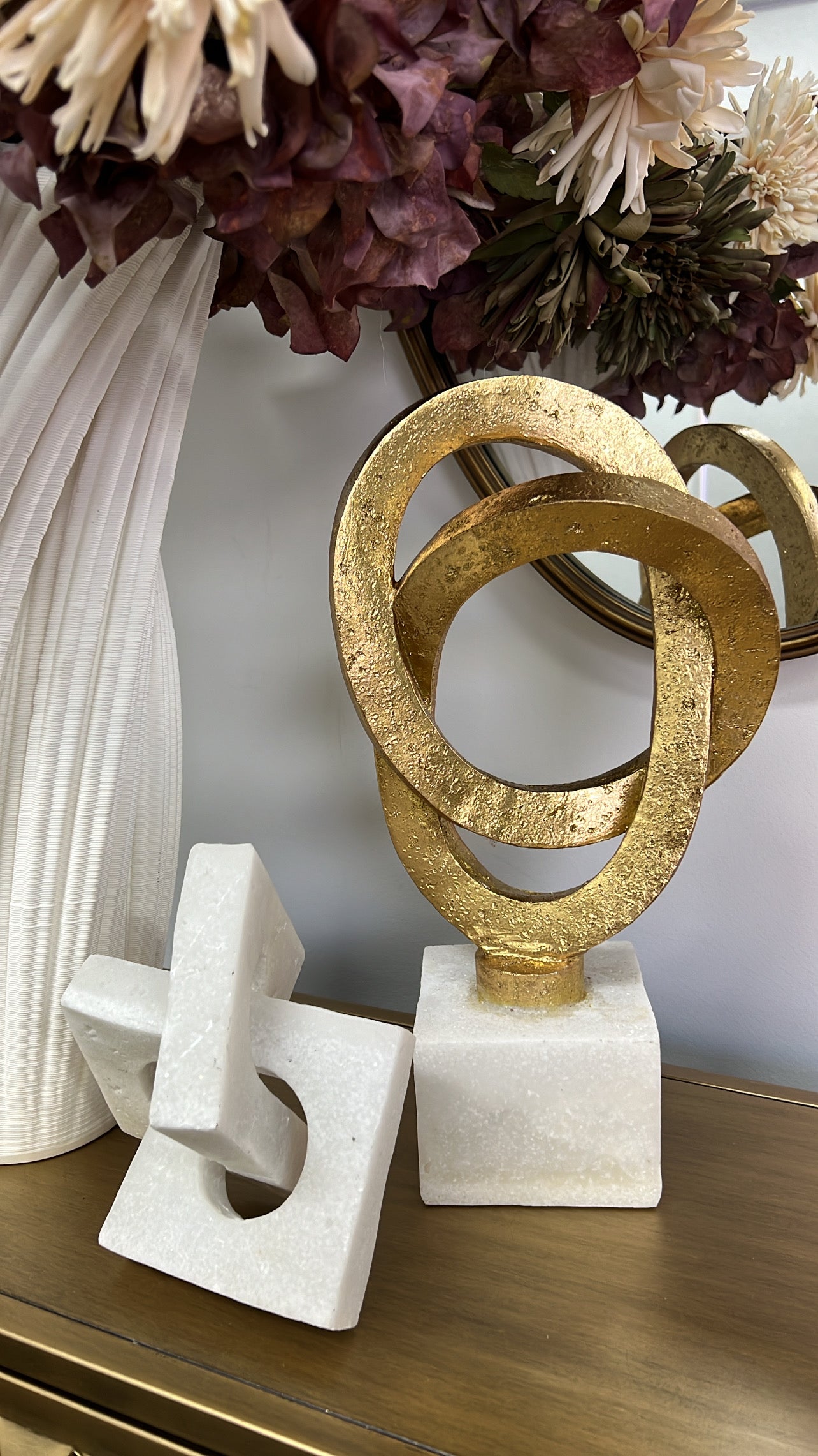 Gold loop sculpture abstract