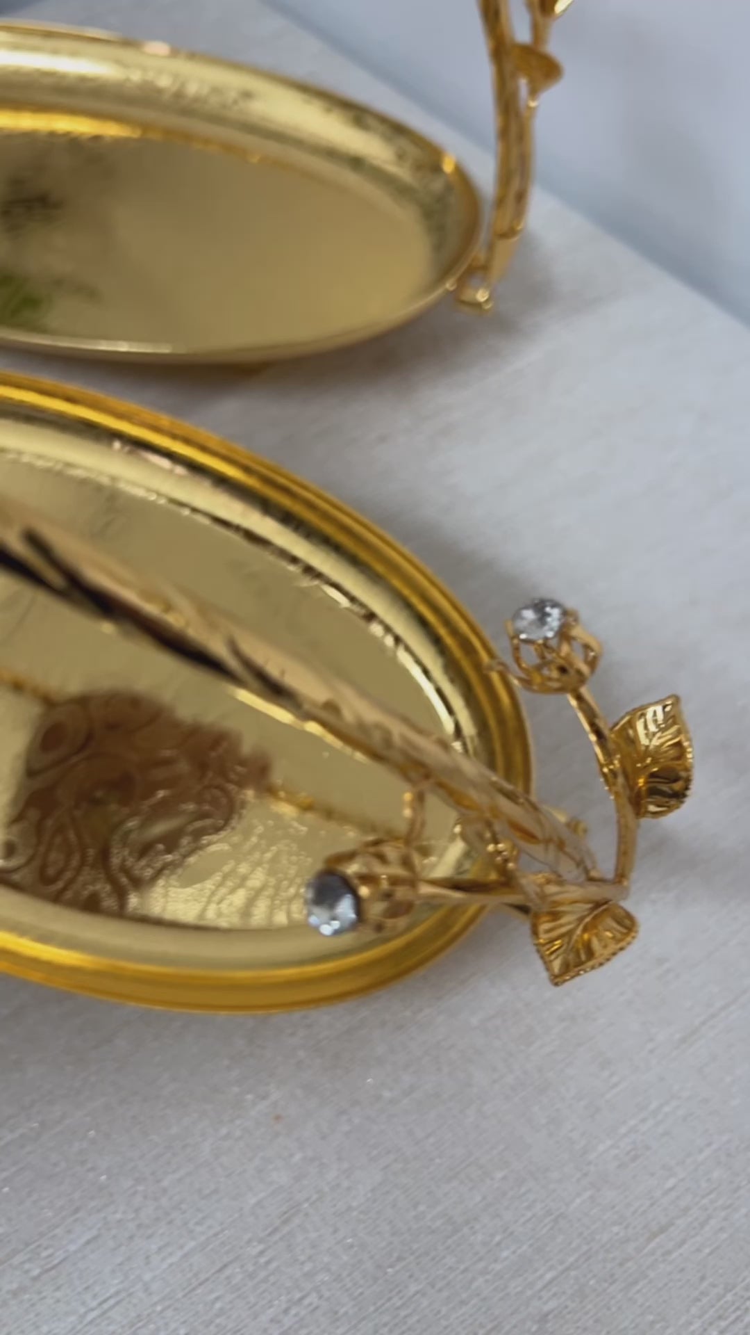 Intricate gold oval serving decorative handle tray