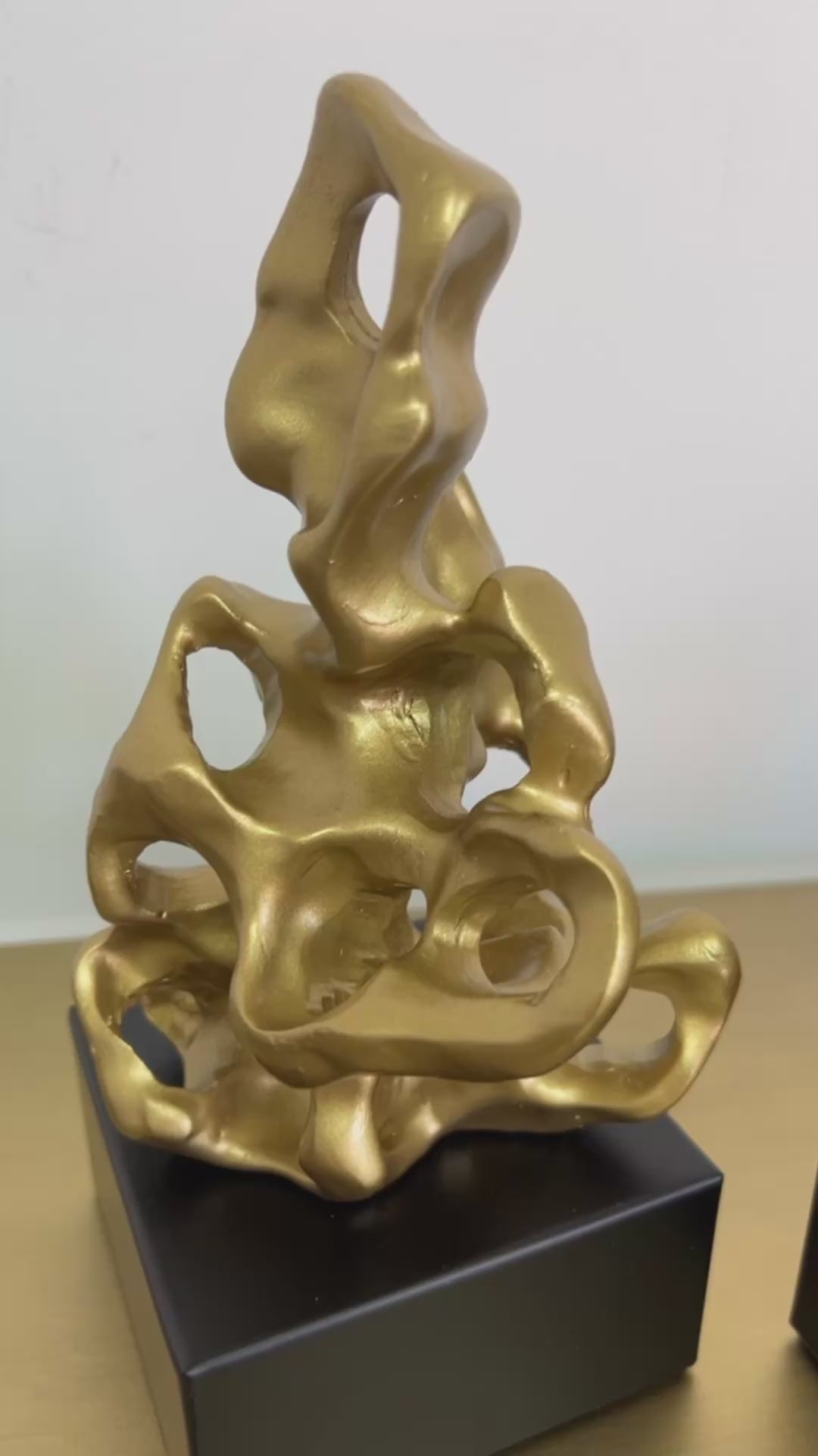 Lava gold and black sculpture